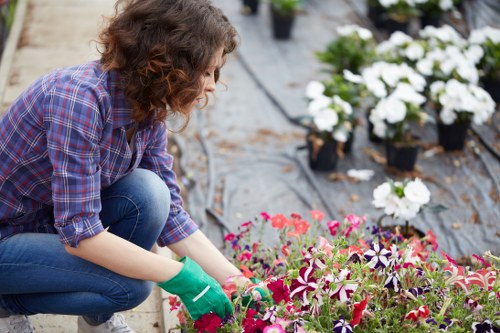 Gardener carrying out a safety check in a garden
